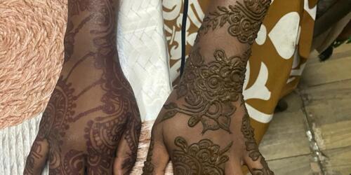 Dried and fresh henna art on skin